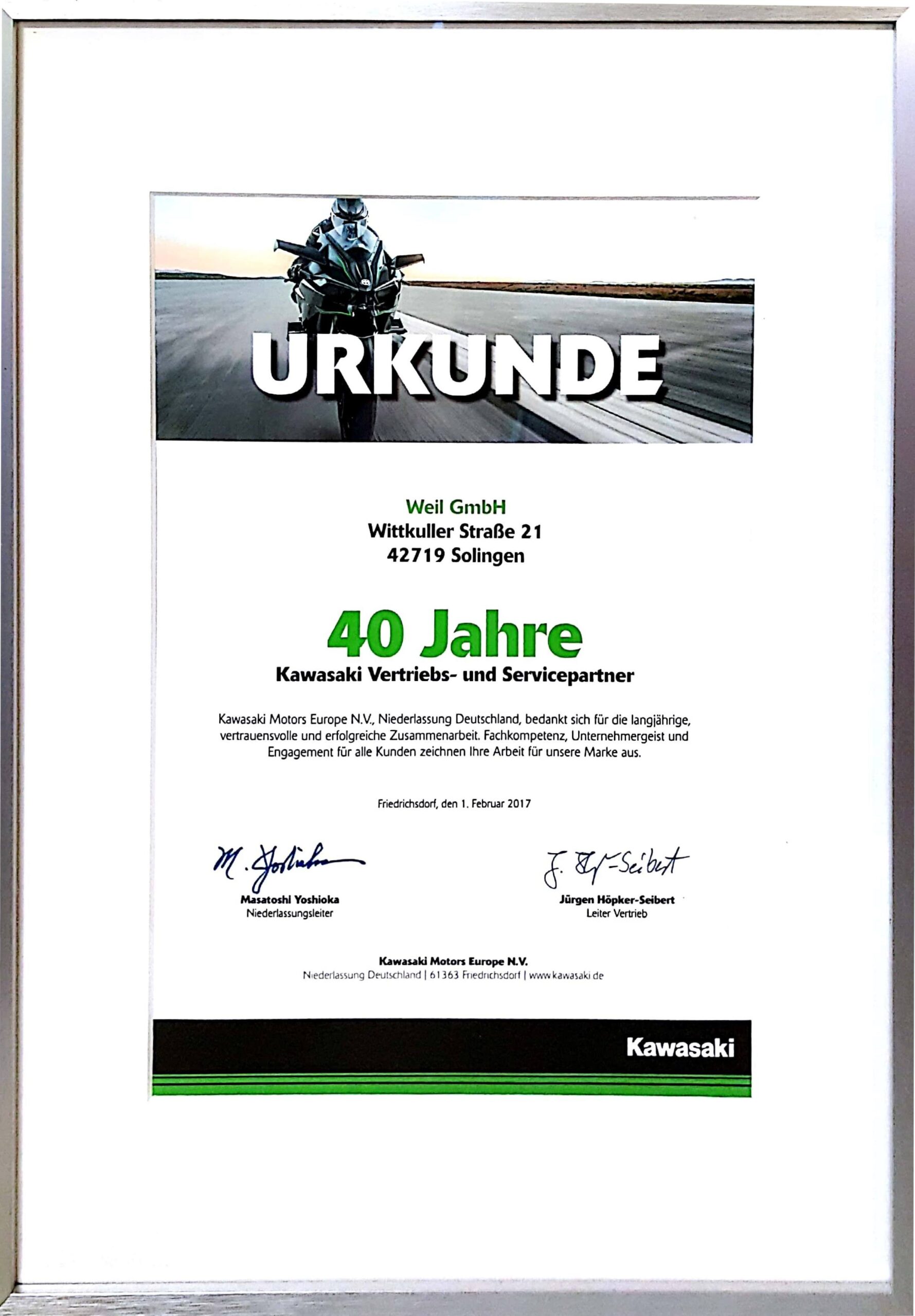 Urkunde für 40 Jahre Kawasaki Servicepartnerschaft